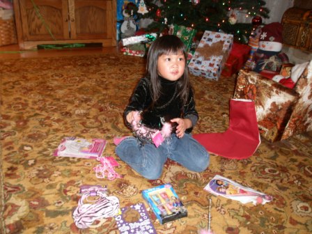 Kasen opening her stocking